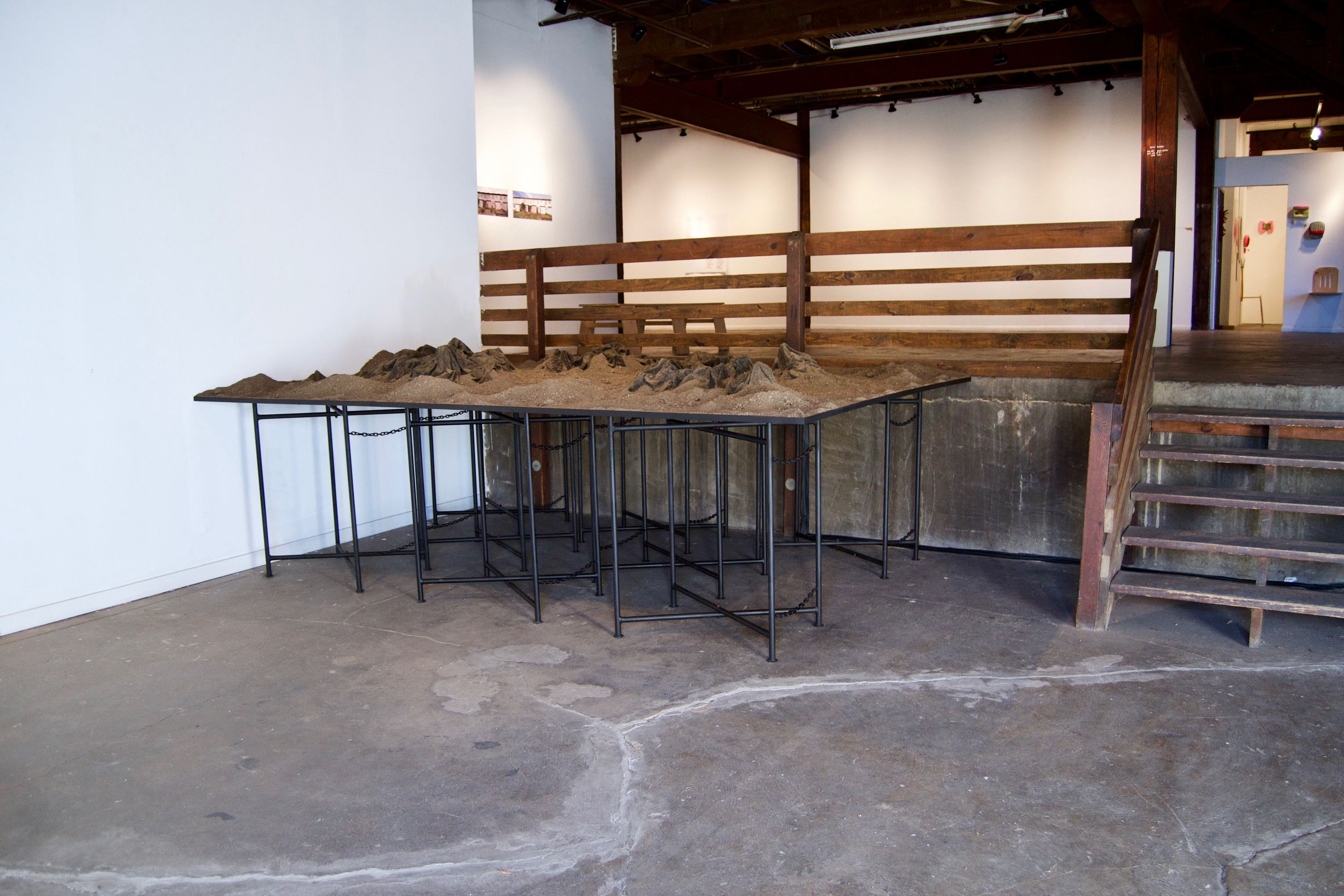 Caroline Hatfield, Land and Water, 2019, 45" x 144" x 96”, mortar stands, plywood, crushed recycled concrete, resin bonded concrete, aluminum, water, water pumps