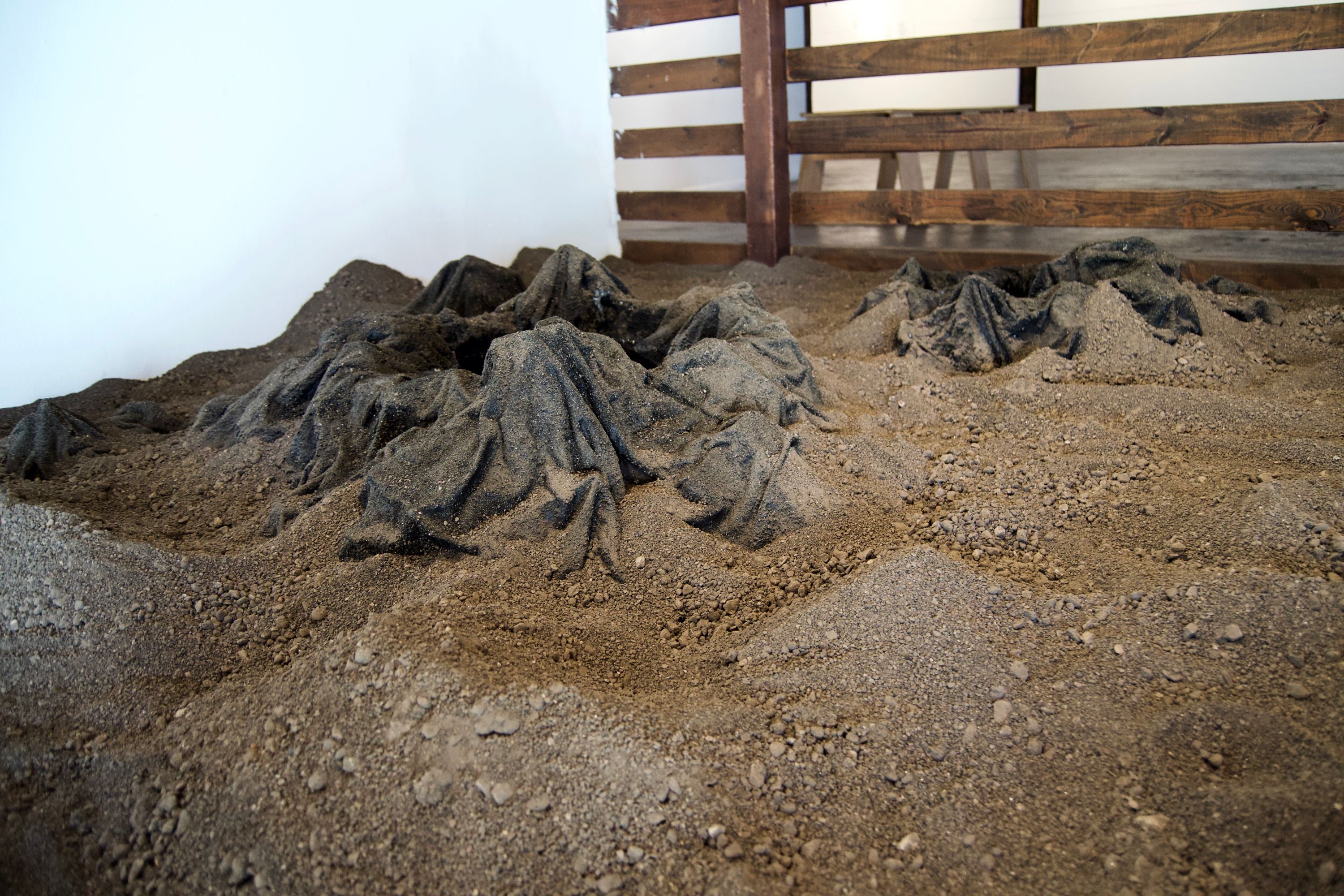 Caroline Hatfield, Land and Water, 2019, 45" x 144" x 96”, mortar stands, plywood, crushed recycled concrete, resin bonded concrete, aluminum, water, water pumps