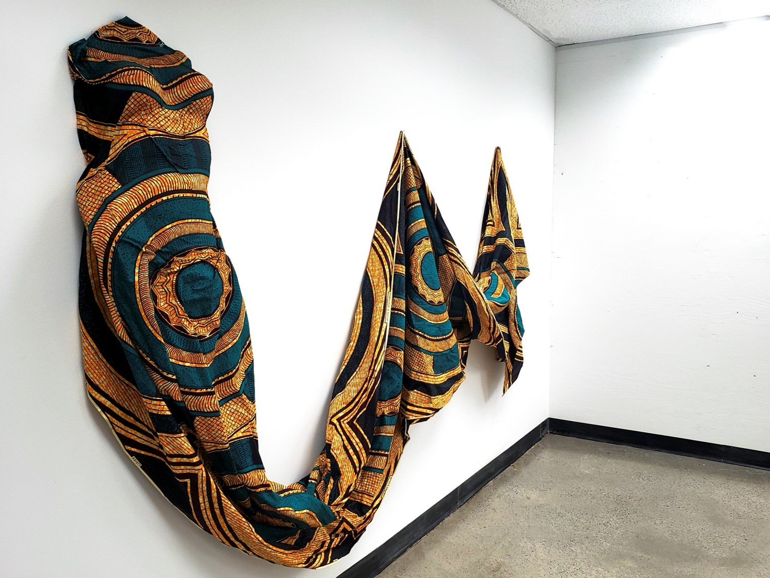 Nyasha Madamombe, Paying Homage I, 2019, fabric installation, 38" x 85" x 6.5"