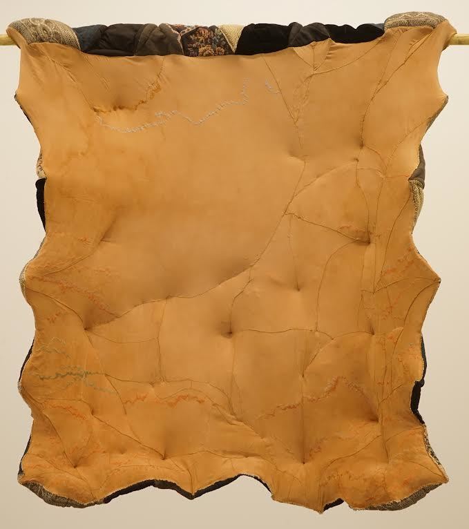 Sharon Havelka, Salmon Skin Fried, 2021, worn out shirts, black velvet pants, upholstery material, other scraps, 39” x 39” x 8”