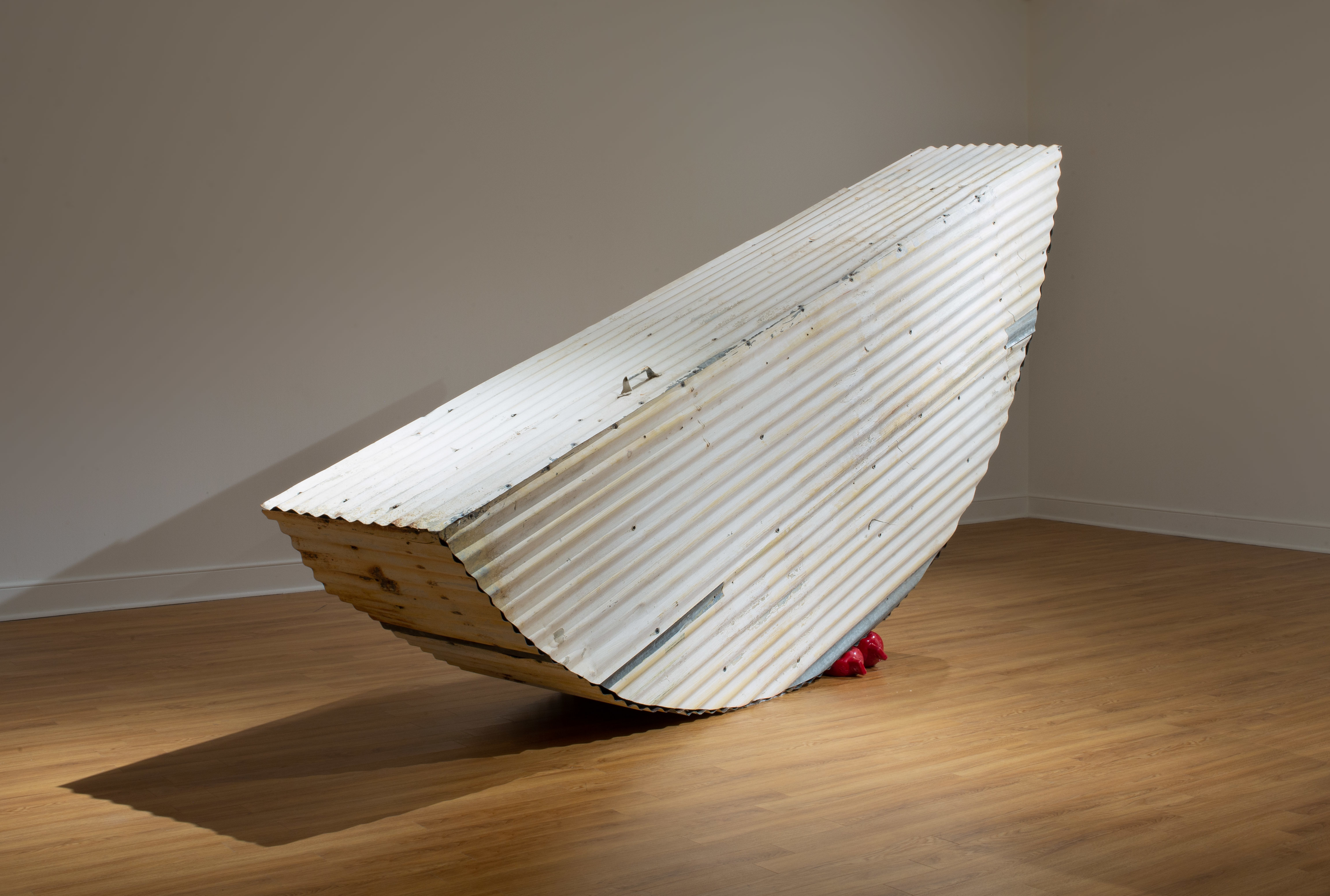 Tracy Treadwell, Fawn on the Water, 2020 (76” x 146” x 26”) painted corrugated tin, steel, pine, polyform boat fender