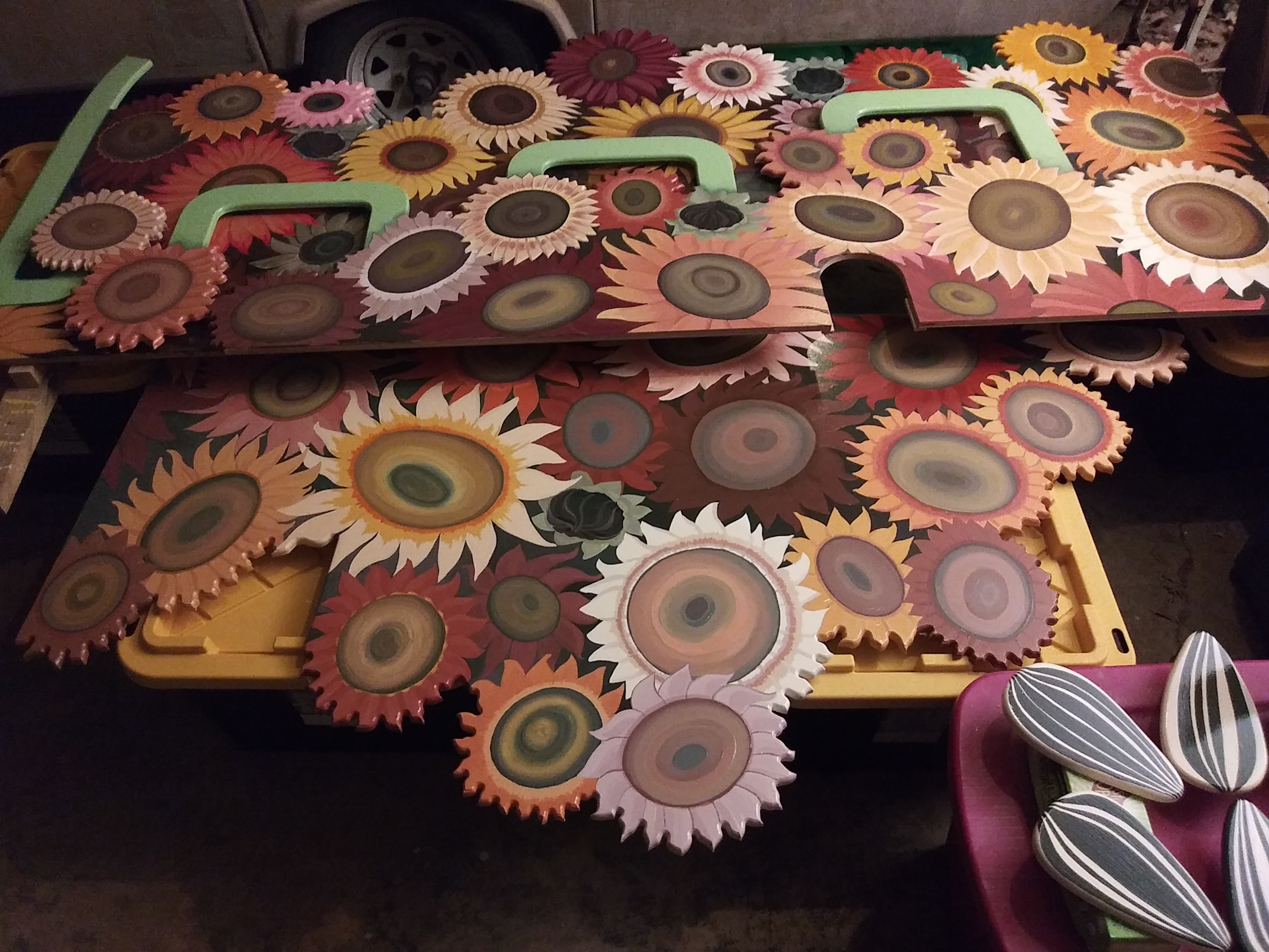 Emily C. Thomas, Virtual Studio Visit, August 2022: Watching the protective coating dry on the completed sunflower panels.