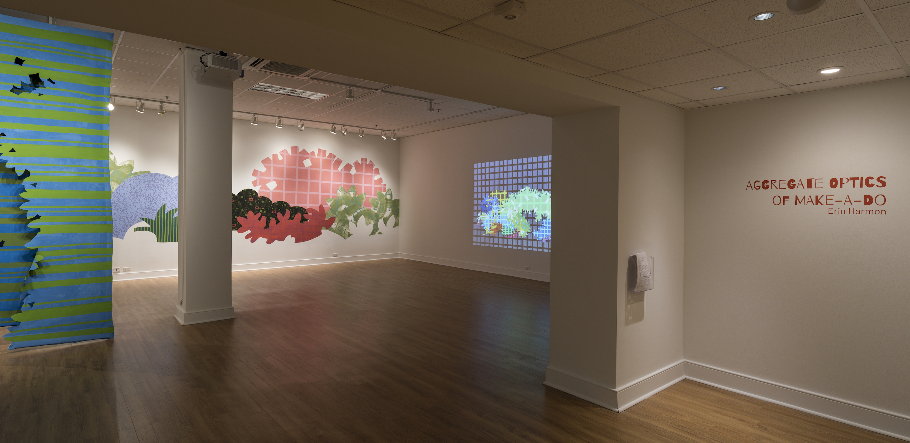 Installation of “Aggregate Optics of Make-A-Do” 2019; University of Memphis, Fogelman Galleries; Works from right to left: Blinky Bricolage (2019) 3 minute animation on loop, projection; Piecemeal Promenade (2019) 48ft x 11ft; latex on muslin cut-outs, adhered to wall; Proscenium Hedgerow (2018) 11ft x 10ft x 2ft; series of three latex on cut muslin panels