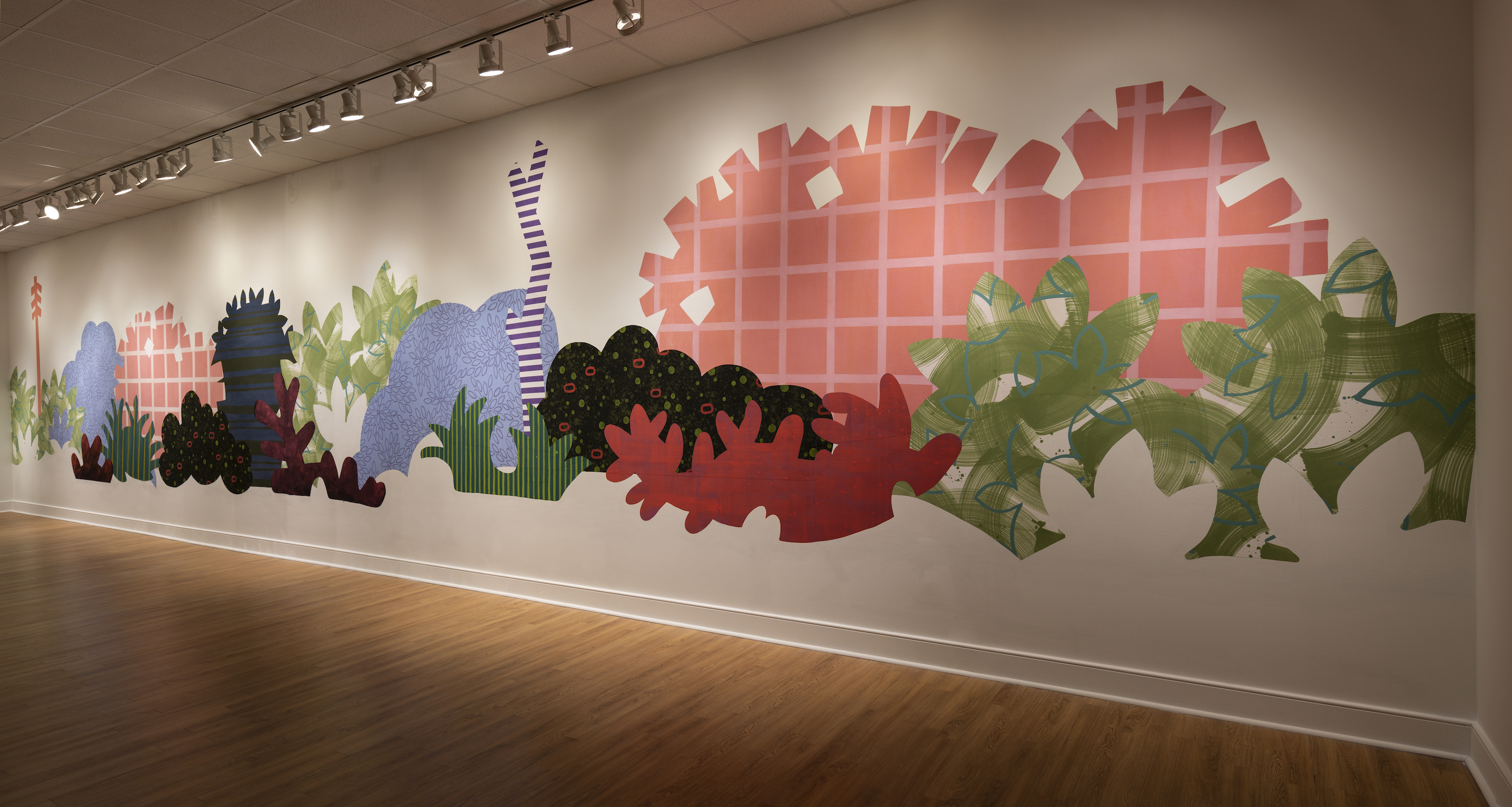 Installation of “Aggregate Optics of Make-A-Do” 2019; University of Memphis, Fogelman Galleries; Piecemeal Promenade (2019) 48ft x 11ft; latex on muslin cut-outs, adhered to wall