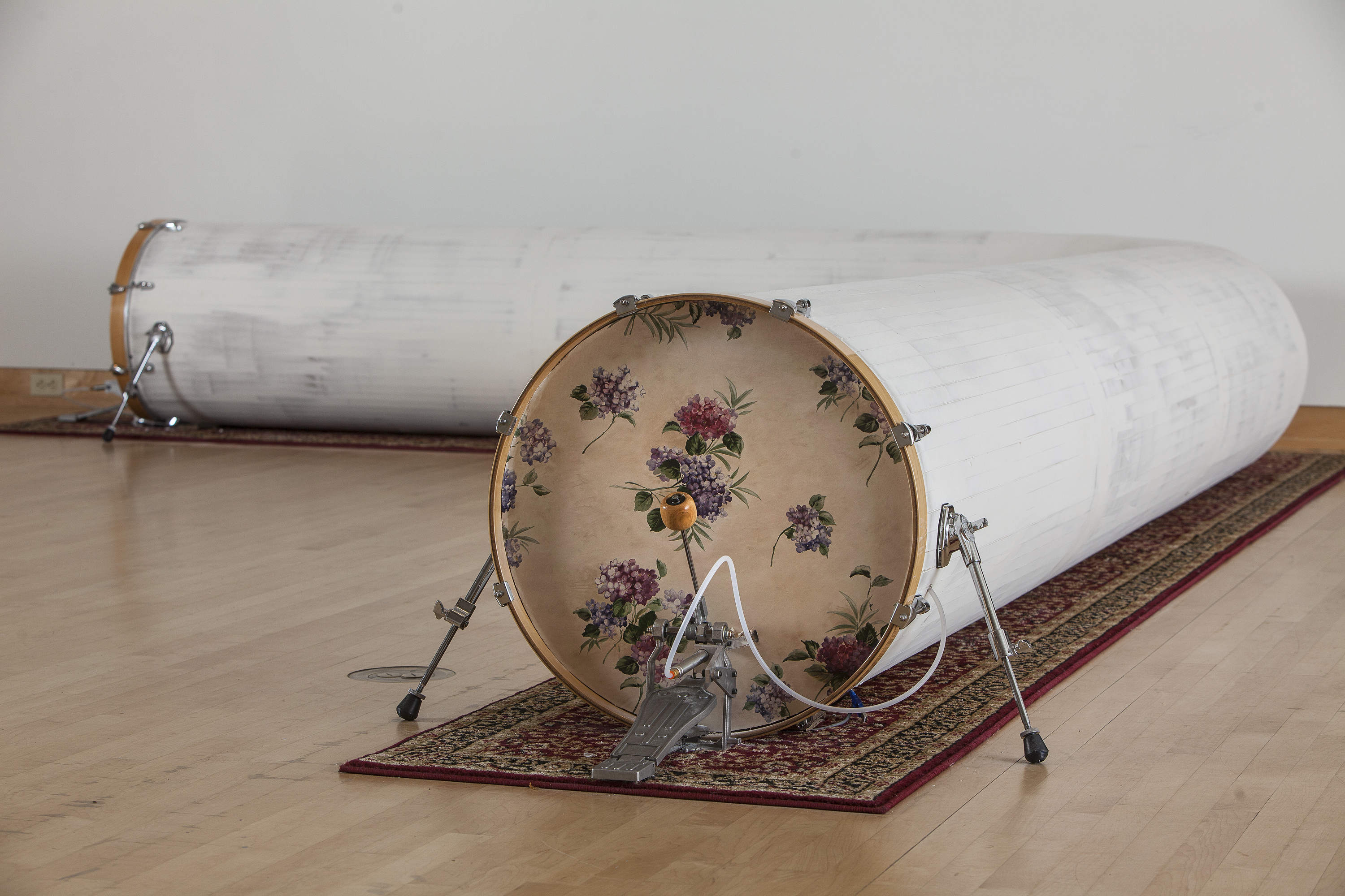 Scott Carter, Safe as Houses, drywall, drum set hardware, wallpaper, carpet, air compressors, proximity sensors, micro controllers, pneumatic bass drum pedals (2015) - photo by Jeff Machtig