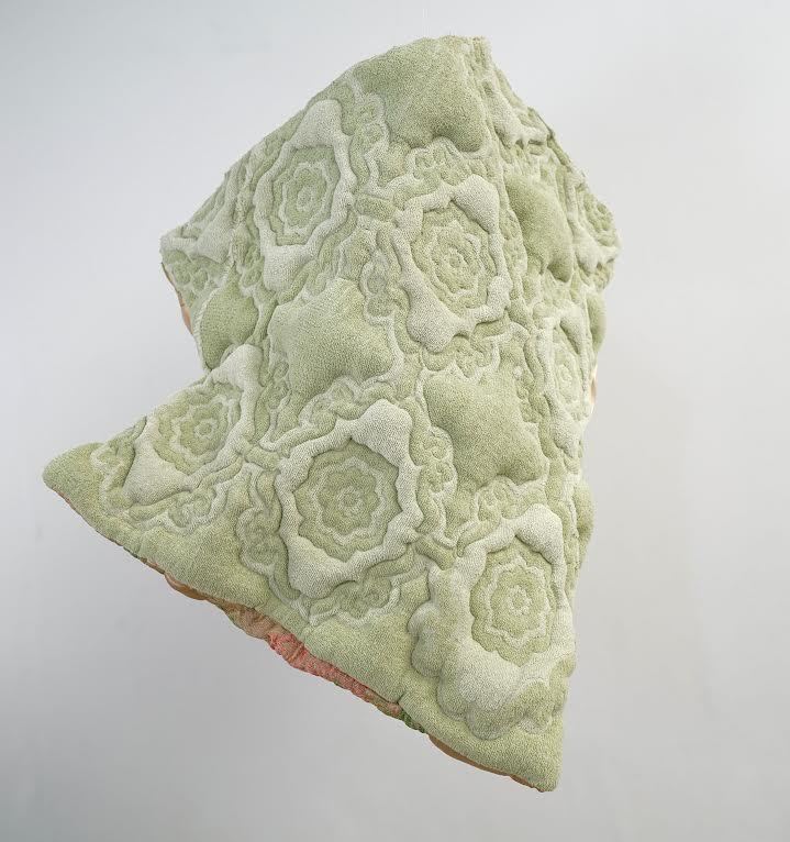 Sharon Havelka, Ohh, 2023, green towel, 18” x 19” x 24”