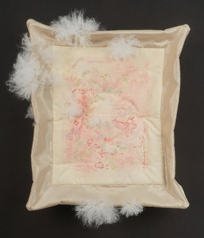  Sharon Havelka, Hairy Tofu, 2020, the tofu is made from my grandmother’s curtains and other linens, a pink print is pulled from a family anniversary party gift book setting the backdrop for a hand embroidered microbiological landscape, 17” x 14” x 5”